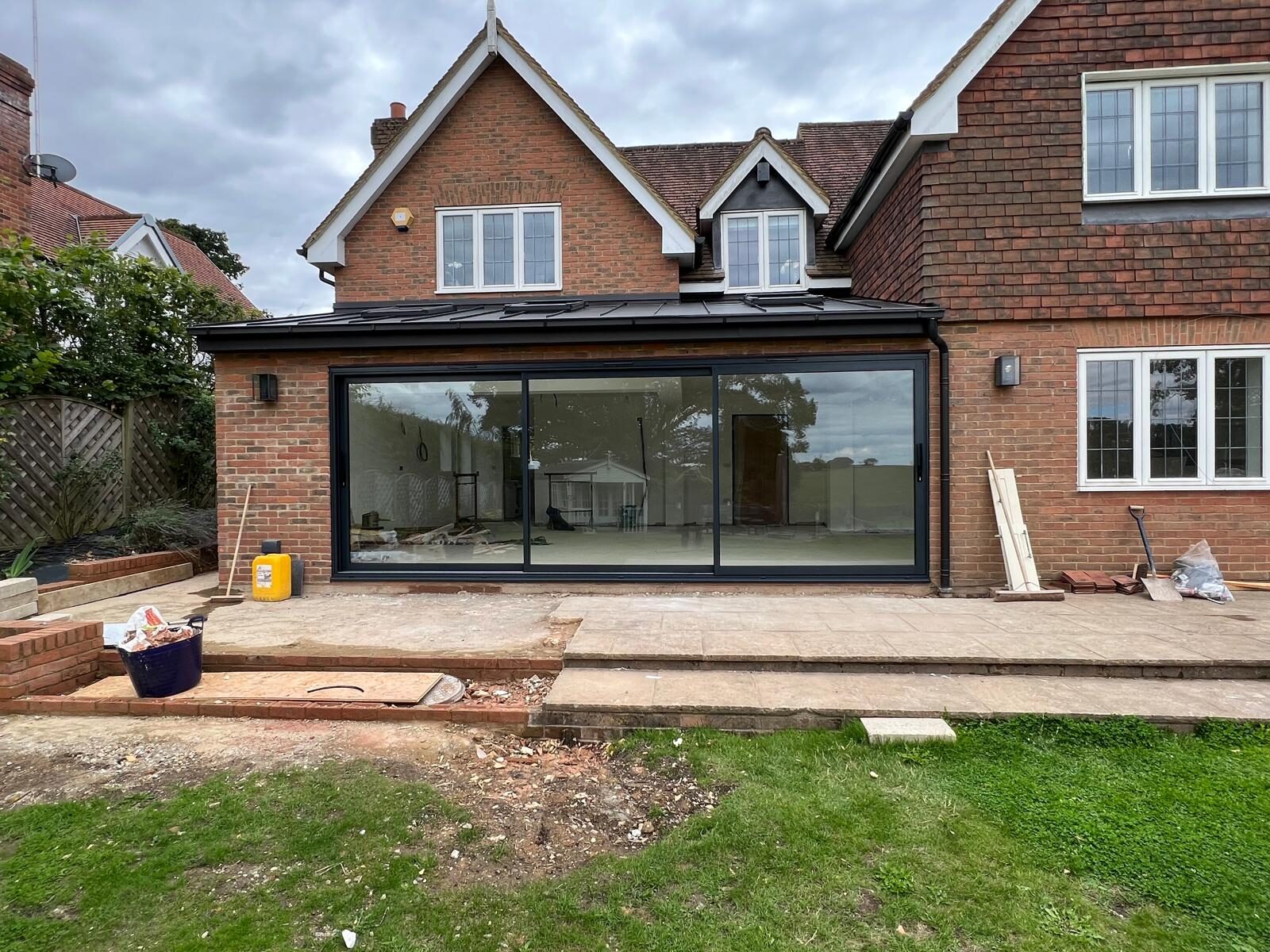 Sliding doors installed on a brick rear extension